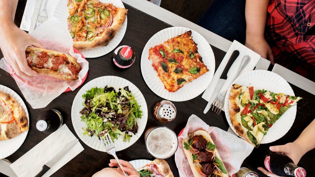 Picture: Dining in at Hello Pizza with slices, salads, meatball subs and craft beer. 